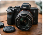 Clear front view of a used mirrorless camera