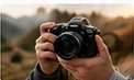 Photographer holding a camera